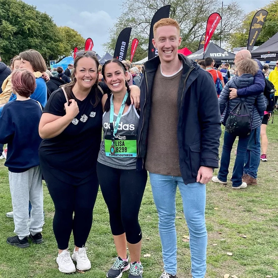 JungleFit members celebrating together at a running event