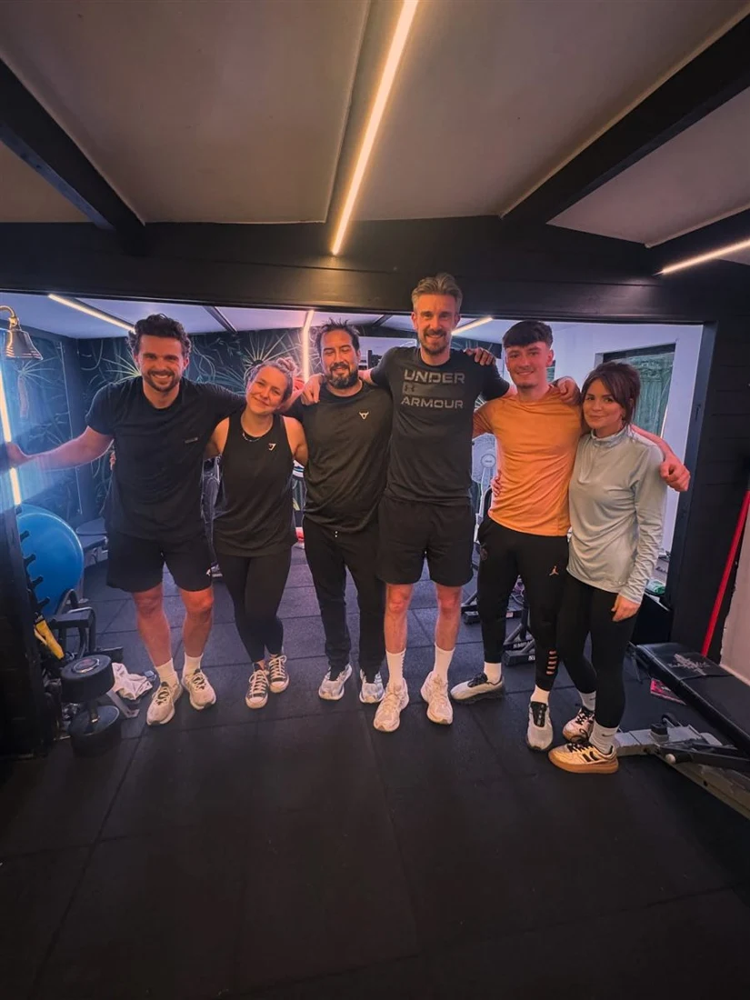 A JungleFit small group together in the studio after training