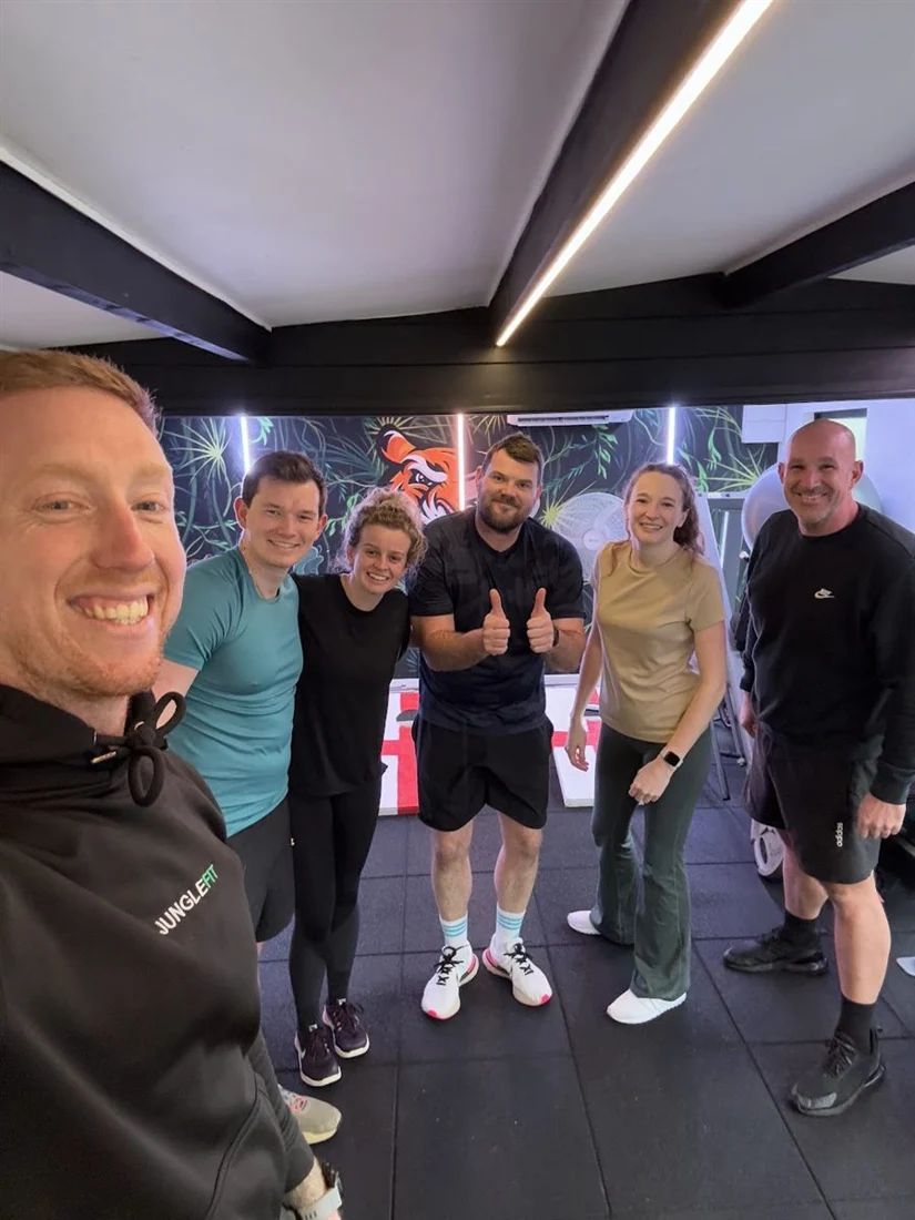 A group selfie in the studio after a session
